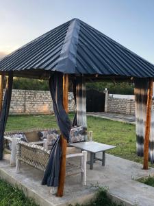 Сад в Diani villa homes