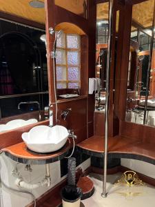 a bathroom with two sinks and a shower at PENTHOUSE PATTAYA in Pattaya +15 photos