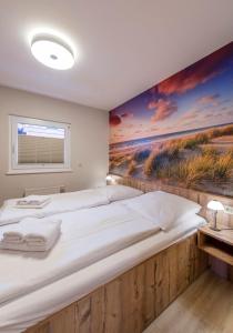 Postel nebo postele na pokoji v ubytování Pamir - 28