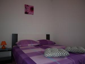 Postel nebo postele na pokoji v ubytování Apartment Luna