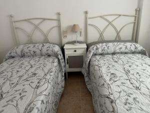 Ένα ή περισσότερα κρεβάτια σε δωμάτιο στο Apartamento en Canet Berenguer Valencia +17 φωτογραφίες