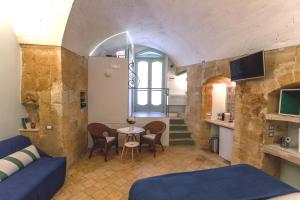 TV a/nebo společenská místnost v ubytování B&B Ponticello a San Potito