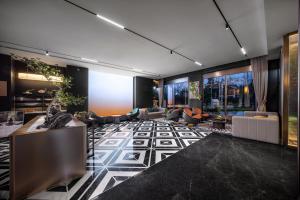 Posezení v ubytování Healing Mind International Hotel Kunming Dianchi Grand View Park Fuhai Metro Station Branch + 63 fotografií