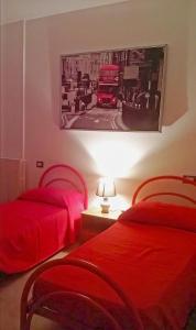 Postel nebo postele na pokoji v ubytování B&B Porta Bazzano