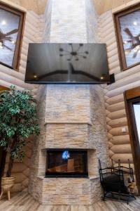 Μια τηλεόραση ή/και κέντρο ψυχαγωγίας στο Log House