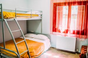 Postel nebo postele na pokoji v ubytování Manolies