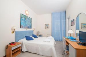 Postel nebo postele na pokoji v ubytování Hotel Majestic + 37 fotografií