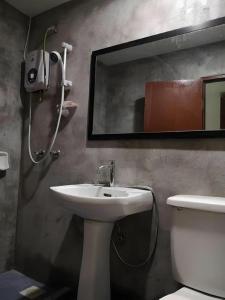 Phòng tắm tại Hotel Sarina