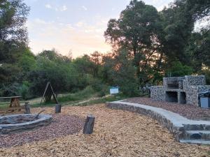 Zahrada ubytování Gaia River Wooden deck campsite
