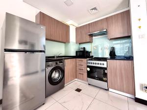 Kuchyň nebo kuchyňský kout v ubytování Luxury Studio Beside Circle Mall