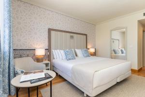 Voodi või voodid majutusasutuse Hesperia Córdoba toas