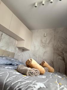 Postel nebo postele na pokoji v ubytování Apartament K&M w Lubniewicach