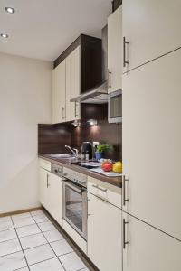 Η κουζίνα ή μικρή κουζίνα στο Seemuschel - 6