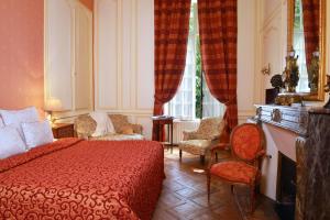 Postel nebo postele na pokoji v ubytování Hôtel d'Argouges