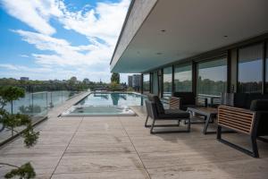 a house with a swimming pool on a building at Main Suites in Frankfurt