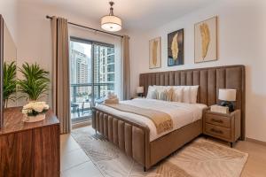 Ένα ή περισσότερα κρεβάτια σε δωμάτιο στο GLOBALSTAY The Residences Tower 1 Apartments +49 φωτογραφίες