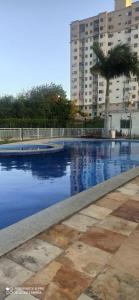 Piscina di Apartamento 1km da praia do Aracagir,próx da av dos holandeses o nelle vicinanze