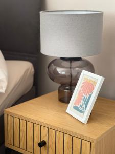 Un pat sau paturi într-o cameră la Ferienwohnung - Auszeit - Buchholzer Straße 29
