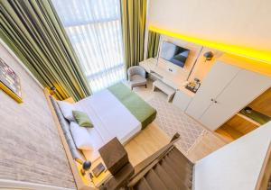 Η κουζίνα ή μικρή κουζίνα στο Ayçiçeği Comfort Otel