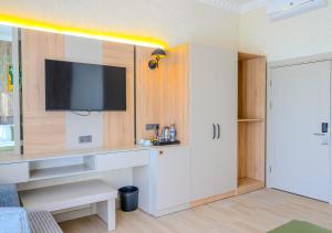 Η κουζίνα ή μικρή κουζίνα στο Ayçiçeği Comfort Otel