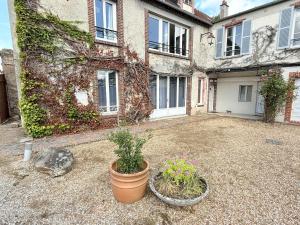 Сад в Un jardin au bord de l'eau