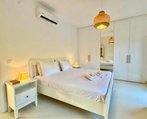 Voodi või voodid majutusasutuse Villa Elyria HIdden Gem toas