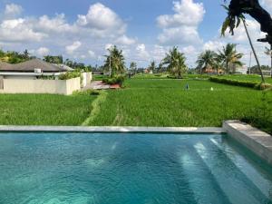 Kolam renang di atau dekat dengan Bungalows 1-3