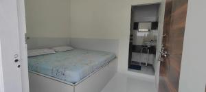 Postel nebo postele na pokoji v ubytování Ahobilam Sri Lakshmi Home Stay + 8 fotografií