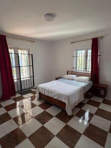 Ένα ή περισσότερα κρεβάτια σε δωμάτιο στο Villa Blue Calodyne