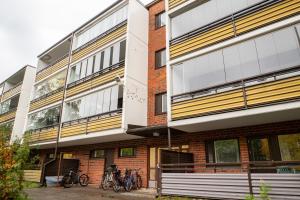a building with bikes parked outside of it at Kaksio keskustan vieressä in Rovaniemi