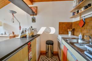 Kuchyň nebo kuchyňský kout v ubytování Enchaple A5