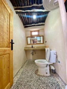 Koupelna v ubytování King Room with Shared Bathroom