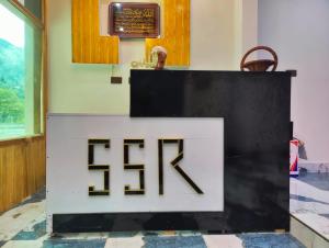 a black and white counter in a room at Serenity Springs Resorts in Muzaffarabad