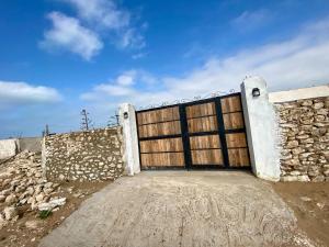 Fotografie z fotogalerie ubytování Rustic King Room with Shared Bathroom v destinaci Wassane + 1 fotografie