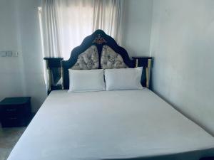 Ένα ή περισσότερα κρεβάτια σε δωμάτιο στο Luxe Haven