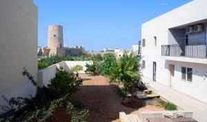 a view of a garden in the middle of a building at Peprina Apt 2 in Central Rabat in Rabat