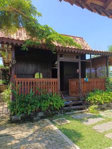 Κήπος έξω από το Homestay Guest House Kang Ayak