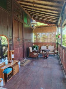 Χώρος καθιστικού στο Homestay Guest House Kang Ayak