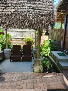 Κήπος έξω από το Homestay Guest House Kang Ayak +9 φωτογραφίες