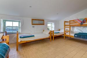 Ένα ή περισσότερα κρεβάτια σε δωμάτιο στο Crashpad Lodges at Yr Helfa +32 φωτογραφίες