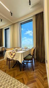 Χώρος καθιστικού στο Tashkent City Downtown Deluxe Host Apartments