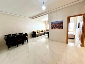 a living room with a couch and a table at Luxury Apartment - Fes Medina in Fès