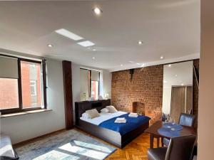 Ένα ή περισσότερα κρεβάτια σε δωμάτιο στο Garsoniera by Rentoom