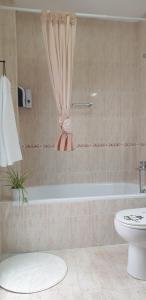 Phòng tắm tại Apartamento El Patio de Alborán +23 ảnh