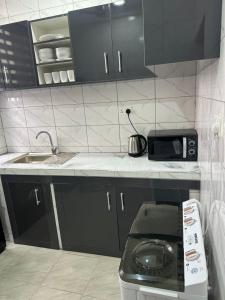 クマシにあるThe Willows Apartment - Cozy Two Bedroom all en-suite Apartmentのギャラリーの写真