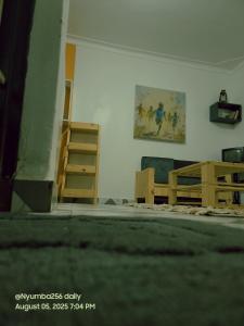 Ảnh trong thư viện ảnh của Vintage Room - Nostalgic charm for couples ở Gulu