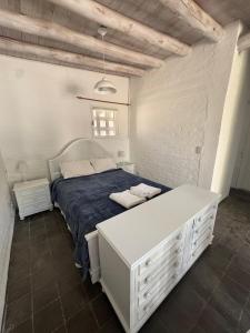 Ένα ή περισσότερα κρεβάτια σε δωμάτιο στο DEL PLATA CABAÑA DE MONTAÑA