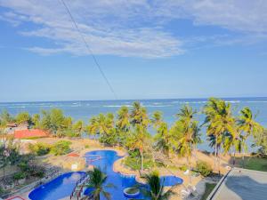 an aerial view of a resort with a water park at Wincome Beachfront Apartments in Mombasa