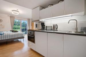 Kuchyň nebo kuchyňský kout v ubytování Ferienwohnung Lütte Veer