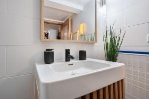Koupelna v ubytování Ferienwohnung Lütte Veer + 15 fotografií